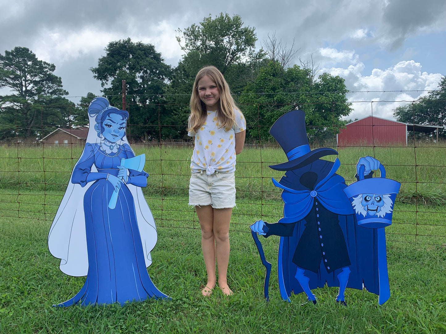 Haunted Mansion ghost bride and Hatbox Ghost Yard display cutouts