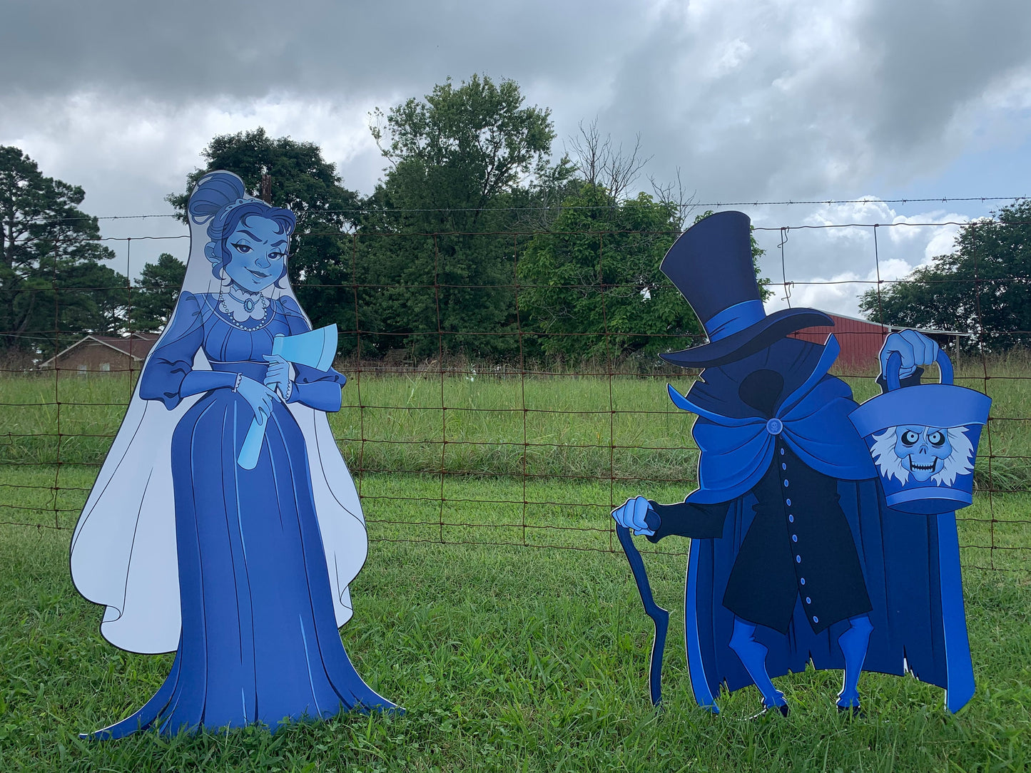 Haunted Mansion ghost bride and Hatbox Ghost Yard display cutouts